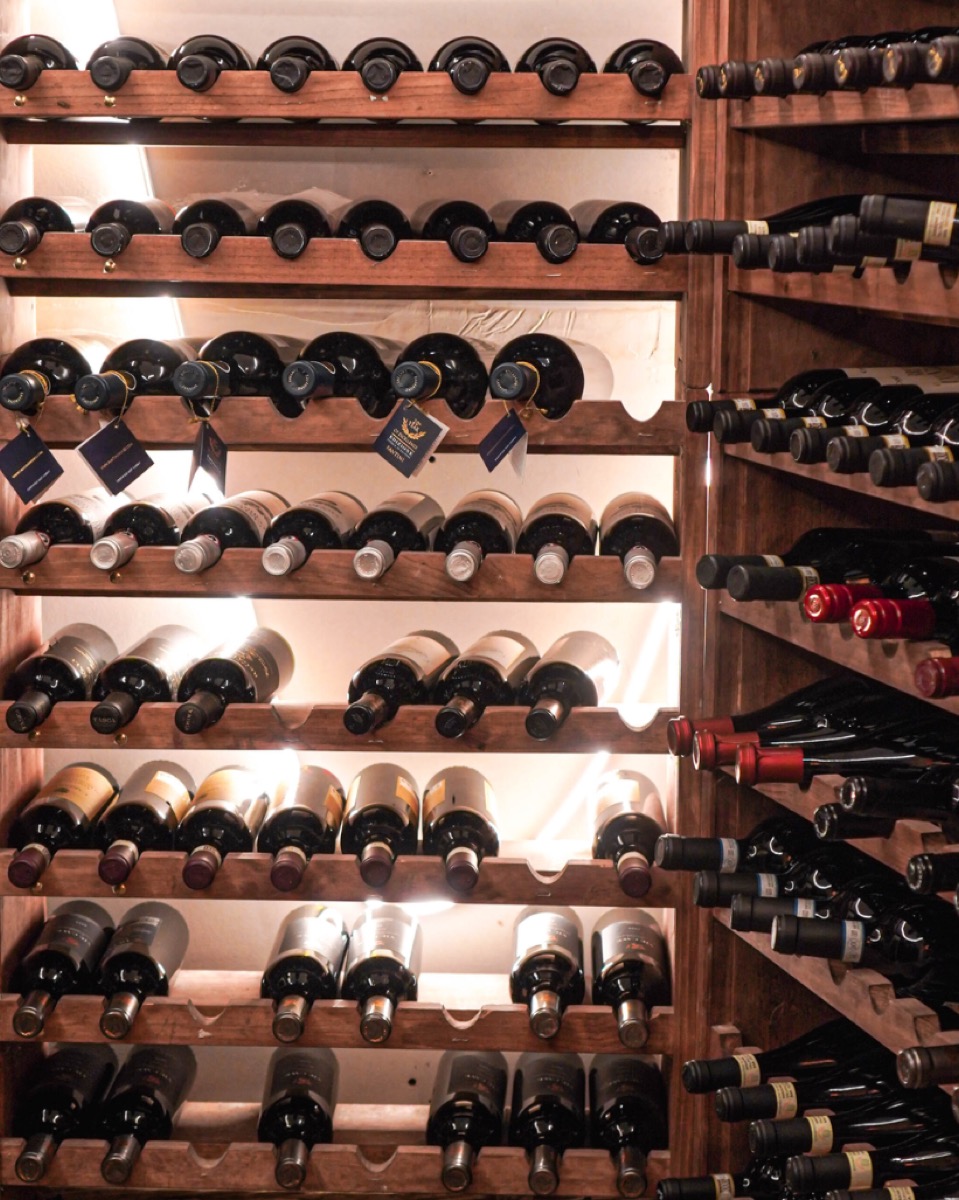 Wine cellar with bottles at Apulia
